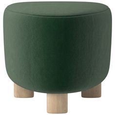 a green stool with wooden legs