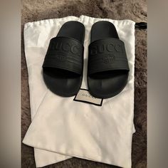 Men’s Gucci Logo Slides In Good Preowned Condition Worn A Few Times Light Scuffing (See Pictures) No Box, Dustbag Included Fits Men Size 8.5 And Women Size 10 Additional Pictures Available Upon Request Fits Men, Gucci Logo, Gucci Black, Gucci Shoes, Shoes Men, Flip Flop Sandals, Mens Fitness, Flip Flops, Slides