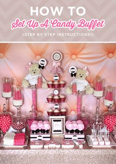 a table topped with lots of pink and white cupcakes