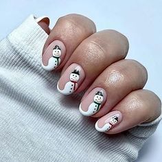 Get into the festive spirit with these short oval press-on nails! Featuring a glossy nude pink base with a cute snowman design, these acrylic nails are perfect for a cozy winter and Christmas look. Easy to apply for a DIY holiday manicure! #ChristmasNails #PressOnNails #SnowmanNails #OvalNails #WinterNails #XmasNails #NailArt #DIYManicure Nail Art Snowman, Snowman Nails Acrylic, Nail Snowman, Christmas Snowman Nails, Snowman Nails Design, Christmas Nails Snowman, Nails Snowman, Snowman Nail Art, Nail Christmas