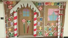 an open door decorated with candy canes and decorations