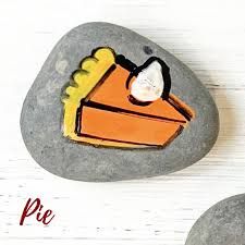 there is a rock with a piece of pie on it