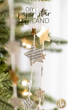 an ornament hanging from a christmas tree with the words diy paper star garland