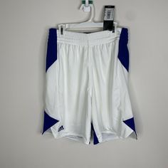 This Is A Nwt Pair Of Adidas Mens Small White And Blue Basketball Shorts. Msrp $40 Please See Last Few Photos For Measurements. Adidas White Athletic Shorts With Moisture-wicking, Adidas White Sportswear Bottoms, Adidas Sporty White Athletic Shorts, White Adidas Sports Shorts, Adidas White Sporty Shorts, Adidas White Sports Shorts, Adidas White Cotton Athletic Shorts, White Moisture-wicking Bottoms For Spring, Adidas White Summer Bottoms