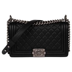 "Chanel Black Quilted Caviar Leather Medium Le Boy Product Details Xupes Ref: CB1293 Brand: Chanel Model: Medium Le Boy Type: Shoulder, Crossbody Serial Number: 23136951 Age: 2017 RRP: £5,800 Accompanied By: Chanel Dust Bag, Box, Authenticity Card, Care Booklet, Ribbon, Protective Felt, Invoice Colour: Black Hardware: Antiqued Silver Material(s): Caviar Leather Specification Height: 16cm Width: 25.5cm Depth: 9cm Strap Drop: Single: 54cm Double: 30cm Interior: Black Textile Closure: S Lock Countr Chanel Boy Bag Black, Handbag Sale, Chanel Crossbody, Gold Chanel, Chanel Shoulder Bag, Small Boy, Dream Bags, Heart Bag, Stylish Shoulder Bag