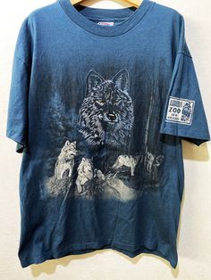 "Vintage Audubon Zoo Wolf Shirt Size: L Made In USA Measurements are taken with the garment laying flat. Chest width: 21\" Body Length : 28\" Condition: Pre-owned 8/10 Material: 100% Cotton Comment Stain No refund. -Payment : accept paypal only -Shipping : to shipping worldwide by registered airmail (small package) Thai post registered. receiving the item within 7-30 business days non sat-sunday working after payment cleared  (some case in Australia/italy/spain/north and south america 2-4 weeks) I ship every day, monday through Friday! Many times your item will go out same day!! Get your stuff super fast when you buy from me! -Check item status out of my country: http://track.thailandpost.co.th 11C" Alpha Wolf, Wolf Shirt, Nature Shirts, North And South, Animal Graphic, Graphic Shirt, Flat Chest, Favorite Shirts, Wolves