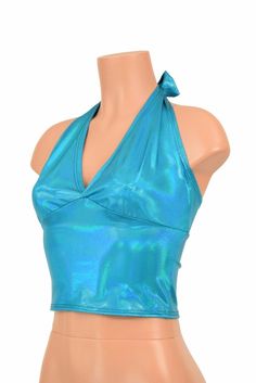 "This item is made to order, please read all the way through the listing before purchasing! This adorable peacock blue holographic halter top ties behind the neck and back for a perfect fit! Darted cups, a wide band below the bust, and a gorgeous rainbow sheen! Extra Small: Bust 31\"-32\" / Waist 24\"-25\" / Hips 33\"-35\" Small: Bust 33\"-34\" / Waist 26\"-28\" / Hips 36\"-37\" Medium: Bust 35\"-37\" /Waist 28\"-31\" / Hips 38\"-40\" Large: Bust 39\"-41\" / Waist 32\"-34\"/ Hips 41\"-43\" Extra Blue Fitted Triangle Halter Top, Blue Triangle Halter Top For Party, Blue Stretch Halter Top For Festival, Metallic Fitted Halter Top For Summer, Metallic Fitted Sleeveless Halter Top, Olive Branch, Peacock Blue, Large Bust, Wide Bands