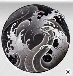 an artistically designed metal object with black and white swirls