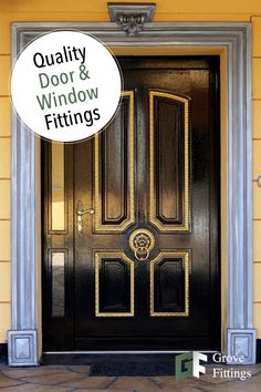 a black door with gold trim and the words quality door & window fittings above it