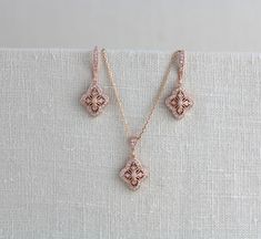 Dainty rose gold necklace created with lovely delicate components set with Swarovski Pure Brilliance cz stones - Handcrafted with Swarovski Pure Brilliance components. - All clear stones - Rhodium, yellow gold or rose gold finish - Necklace measures 16 inches and extends to 18 inches - Nickel free and hypoallergenic - PLEASE ALLOW APPROX 7 BUSINESS DAYS FOR COMPLETION BEFORE SHIPPING ** This listing is only for the necklace This is an original design by © Treasures by Agnes Matching pieces: http Rose Gold Necklace Simple, Simple Bridal Necklace, Bridal Pendant Necklace, Dainty Rose Gold Necklace, Bridal Pendant, Dainty Rose, Gold Necklace Simple, Rose Gold Bridal, Cz Necklace