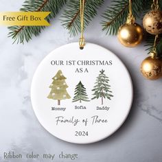 personalized christmas ornament for family of three with pine trees and gold baubons