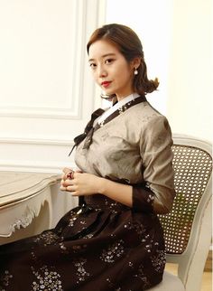 This is a Korean Modern Hanbok Blouse/Shirt(Jeogori) for Women.This blouse features elegant fabric with butterfly and flower patterns and luxurious gold-brown color.This hanbok is modernly designed so you can wear it comfortably and beautifully.This modern hanbok is perfect dress for daily and celebrations such as parties or various events. Decorate more stylishly with accessories that go well with Hanbok. Go look hanbok accessories:https://www.etsy.com/shop/LunarJogak?ref=seller-platform-mcnav& Hanbok Accessories, Hanbok Women, Casual Party Dress, Modern Hanbok, Top Korean, Butterfly And Flower, Elegant Fabric, Casual Party Dresses, Women Blouse