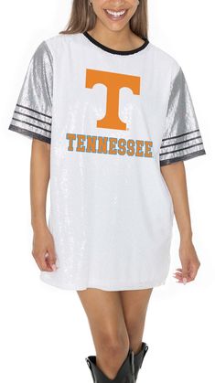 Design Short sleeve, crew-neck dress Feminine fit Style and Team Spirit Screen-printed team graphics Additional Details Officially licensed product Fall Crew Neck Dress With Letter Print, Spring Cheerleading Crew Neck T-shirt, White Sequin Dress, Dress Feminine, Gameday Couture, Tennessee Volunteers, Crewneck Dress, Feminine Dress, Dress Medium