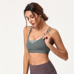 The EMES SHOP sports bra is detailed with a scoop neckline. double shoulder straps. and contouring seams. Features a criss cross back and an adjustable clasp. This breathable. quick-drying. and supportive sports bra is perfect for any high impact workouts. MATERIAL: 80% Nylon. 20% Spandex MEASUREMENTS: * Small | Bust: 27.6" in . Band: 23.6" in . Length: 11.8" in * Medium | Bust: 29.1" in . Band: 25.2" in . Length: 12.2" in * Large | Bust: 30.7" in . Band: 26.8" in . Length: 12.6" in * X-Large | Bust: 32.3" in . Band: 28.3" in . Length: 13" in MEASUREMENTS: * Small | Bust: 70" cm . Band: 60" cm . Length: 30" cm * Medium | Bust: 74" cm . Band: 64" cm . Length: 31" cm * Large | Bust: 78" cm . Band: 68" cm . Length: 32" cm * X-Large | Bust: 82" cm . Band: 72" cm . Length: 33" cm 4-way Stretch Sports Bra With Straps For Gym, Gym Sports Bra With 4-way Stretch Straps, Sports Bra With Straps For Workout, Nylon Yoga Activewear With Straps, Sporty 4-way Stretch Activewear With Straps, Sporty Activewear With 4-way Stretch And Straps, Sports Bra With 4-way Stretch And Strappy Back, Strappy Moisture-wicking Sports Bra In Athleisure Style, Athleisure Activewear With Straps For Light Exercise