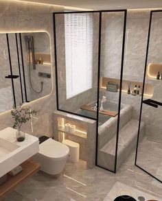 a bathroom with a sink, toilet and bathtub