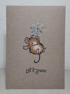 a card with a mouse on it saying let it snow