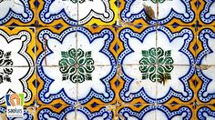 colorful tiles with designs on them in different colors