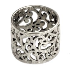 This band ring of exotic Balinese elegance is crafted by Nyoman Rena. Featuring florid openwork, the sterling silver band ring is crafted by hand and has a hammered finish. Sterling silver Hammered finish Handmade in & fairly traded from Indonesia Due to the width of this ring, we recommend ordering one size larger than usual to ensure a comfortable fit Paw Print Jewelry, Ribbon Jewelry, Fair Trade Jewelry, Bali Silver, Ringe Gold, Sterling Silver Rings Bands, Printed Jewelry, Hammered Sterling Silver, Wide Band Rings