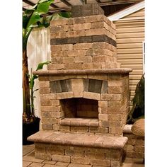 Round Grove Fireplace Kit in Mini Finished with Paver Stone Outdoor Fireplace With Pizza Oven, Fireplace With Pizza Oven, Fireplace And Pizza Oven, Outdoor Fireplace Pizza Oven, Brick Oven Outdoor, Outdoor Fireplace Designs, Outdoor Kitchen Cabinets, Standing Seam Metal Roof, Backyard Fireplace