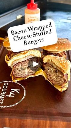 the bacon wrapped cheese stuffed burgers are ready to be eaten