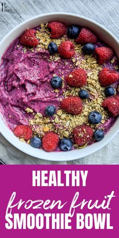 healthy frozen fruit smoothie bowl with raspberries and blueberries