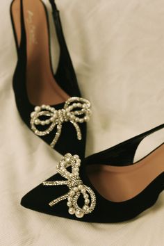 Black Heels With Rhinestones, Black Wedding Heels, Fancy Black Heels, Black Shoes Bow, Heels With Bows, Black Bow Shoes, Black Pearl Heels, Chic Black Heels With Bow, Chic Black Slingback Pumps With Bow