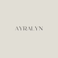 the word'ayralyn'written in black ink on a gray background