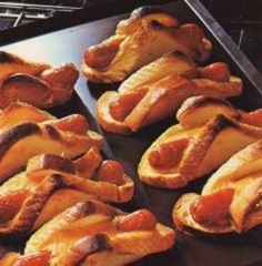 some food that is sitting on top of a pan in the oven and ready to be cooked