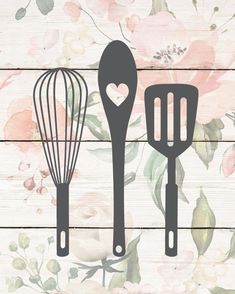 two kitchen utensils on a wooden background