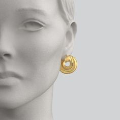 Elevate your elegance with Modern Italian Gold Hoop Earrings from the Vento Collection. Handmade in Italy, these exquisite 14K gold earrings feature a captivating spiral shape, a unique wavy texture on the surface, and polished edges. Discover the artistry and craftsmanship that define Italian fine jewelry, and make a statement with this contemporary masterpiece. The spiral earrings are secured by a trusty snap lever closure. A sophisticated and unique piece of jewelry. 14K gold 27 mm diameter ideal for an elegant look designed and produced in Italy Spiral Shape, Italian Jewelry, Spiral Earrings, Gold Hoop, Gold Hoop Earrings, Italian Design, Ring Verlobung, Unique Pieces, Gold Earrings