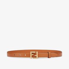 Thin belt with loop and iconic FF stud buckle. Made of natural-coloured leather. Gold-finish metalware. Made in Italy. Size 65 Fendi Logo Design, Fendi Store, Fendi Logo, Belt Brown, Metal Accessories, Exclusive Gift, Colored Leather, Fall Collection, Fall Collections