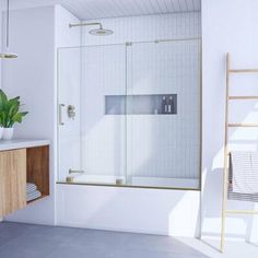 a bathroom with a sink, mirror and bathtub