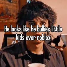 a man holding a cup with the caption he looks like he bullies little kids over roblox