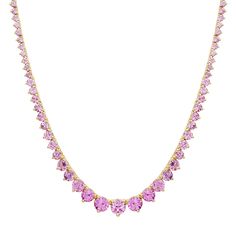 Crafted in 18-karat yellow gold, our Large Graduated Pink Sapphire 3-Prong Tennis Necklace is set with 11.03 carats of round, brilliant cut Pink Sapphires - with the largest stone set in the center and gradually get smaller - a stunning piece with timeless appeal! A styling tip from Jen - "Wear yours from day to night and everywhere in between! Layered or on its own, it's one of my all time favorites from the collection!" Carat Weight: 11.03cts Necklace measures 16" in length Push clasp fastenin Round Gemstone Tennis Necklace Fine Jewelry, Elegant Round Gemstone Tennis Necklace, Luxury Round Gemstone Tennis Necklace, Elegant Gemstone Tennis Necklace, Anniversary Gemstone Tennis Necklace, Anniversary Round Gemstone Tennis Necklace, Elegant Heart Cut Tennis Necklace, Formal Cubic Zirconia Tennis Necklace With Gemstones, Luxury Gemstone Tennis Necklace