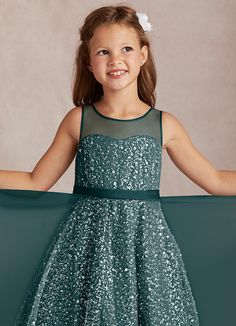 Cut from our all over beaded fabric and stretch satin, Siwa is perfect for flower girls that love ball gowns and sparkles. Her tulle bateau neckline has an under sweetheart bodice. A scratch satin belt sits at the waist, adding a touch of elegance and defining the ballgown skirt that is perfect for twirling and dancing. Flower Girl Dresses Navy, Ballgown Skirt, Beaded Fabric, Satin Belt, Tulle Flower Girl, Beaded Tulle, Ball Gown Skirt, Flower Girl Dresses Tulle, Dress Flower