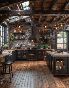 an industrial style kitchen with wood flooring and exposed brick walls is pictured in this image