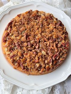 a pecan pie is on a white plate