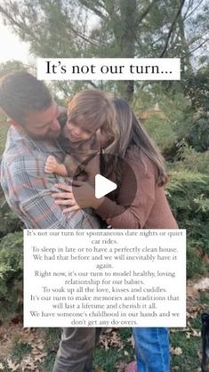 a man and woman hugging each other in the woods with text that reads, it's not our turn