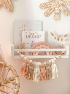 a pink and white room with some decorations