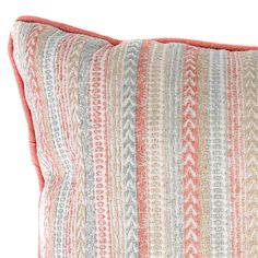 an orange and blue striped pillow on a white background