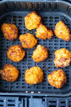 some fried food is in a black container