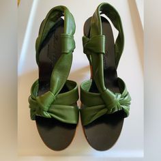 Stunning Robert Clergerie Size 8.5 Wedge Sandals In Buttery Soft Green Leather. Unworn In Original Box. 4 1/2 Inch Heel With 2 Inch Platform So Feels Like A 2 1/2 Inch Heel. The Original Box Is Distressed A Bit. Green Wedge Sandals With Block Heel, Green Platform Wedge Sandals With Open Heel, Chic Green Wedge Sandals With Open Heel, Elegant Green Wedge Sandals With Round Toe, Chic Green High Heel Wedge Sandals, Chic Green Open Heel Wedge Sandals, Elegant Green Wedge Sandals, Elegant Green Open Toe Wedge Sandals, Green Wedge Sandals With Heel Strap And Round Toe