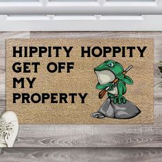 a door mat that says hippy hoppity get off my property