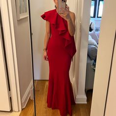 Red One Shoulder Gown With Ruffle. 98% Poly, 2% Spandex. Worn 1x To A Black Tie Charity And 1x To A Marine Corps Ball. Heavy Fabric And Lined - Perfect For Formal Winter Or Fall Events. Image Looks Stained But It’s Water From My Steamer When I Was Preparing For The Photos - It’s In Perfect Condition. 57inches From Shoulder To Hem. Elegant Red Stretch Evening Dress, Red Stretch Evening Dress For Formal Occasions, Red Stretch Evening Dress, Red Stretch Evening Dress For Gala, One-shoulder Fitted Evening Dress For Red Carpet, Fitted One-shoulder Evening Dress For Red Carpet, Chic Red Evening Gown, Red Fitted One-shoulder Gown, Chic Fitted Gown For Red Carpet