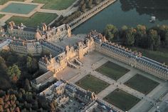 an aerial view of the palace and gardens