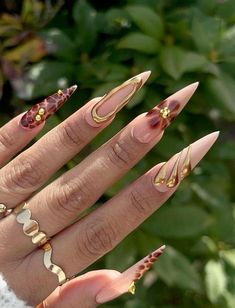 Long Boho Nails, Acrylic Nails Stiletto Design, Short Almond Nails Designs Summer 2024, Long Almond Fall Nails, Earthy Nails Designs Almond, Gold Nails Almond Shape, Long Nail Designs Stilettos, Stilleto Nail Ideas, Stilleto Nails Long Designs