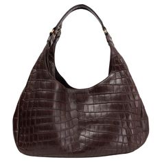 100% authentic Bottega Veneta shoulder bag in espresso brown matte crocodile. Closes with a magnet on top. Lined in light beige suede with a cell phone pocket against the front and a zipper pocket against the back. Has been carried and is in excellent condition. Measurements Height 21cm (8.2in) Width 38cm (14.8in) Depth 15cm (5.9in) Drop of the Handle 22cm (8.6in) Hardware Light Gold-Tone Blindstamp 125787 V91202040 All our listings include only the listed item unless otherwise specified in the description above. Bottega Veneta Chain Pouch, Bottega Veneta The Pouch, Bottega Bag, Bottega Veneta Pouch, Bottega Veneta Cassette, Hand Bags For Women, Bottega Veneta Bag, Bottega Veneta Bags, Espresso Brown