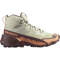 a white and brown shoe with the word salmon on it