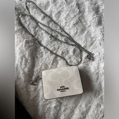 Mini Coach Wallet Chic White Wallet On Chain For Everyday, Rectangular Wallets With Chain Strap As Gift, Coach Rectangular Wallet On Chain, Coach Rectangular Wallet On Chain With Strap, Everyday Rectangular Wallet With Chain Strap, Coach Rectangular Wallet On Chain For Everyday Use, Chic Wallet With Chain Strap For Gift, Chic Wallet With Chain Strap As Gift, Chic Wallets With Chain Strap For Gift