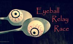 two spoons with fake eyeballs on them and the words eyeball relay race